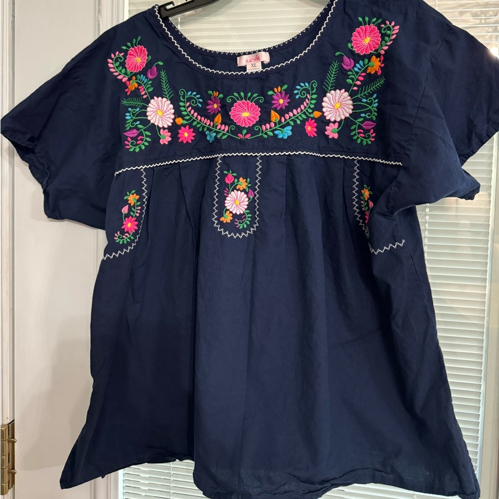 Cute embroidery top blouse.